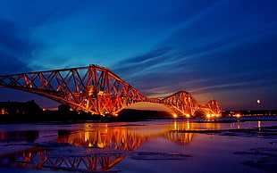 Bridge with orange light during night time